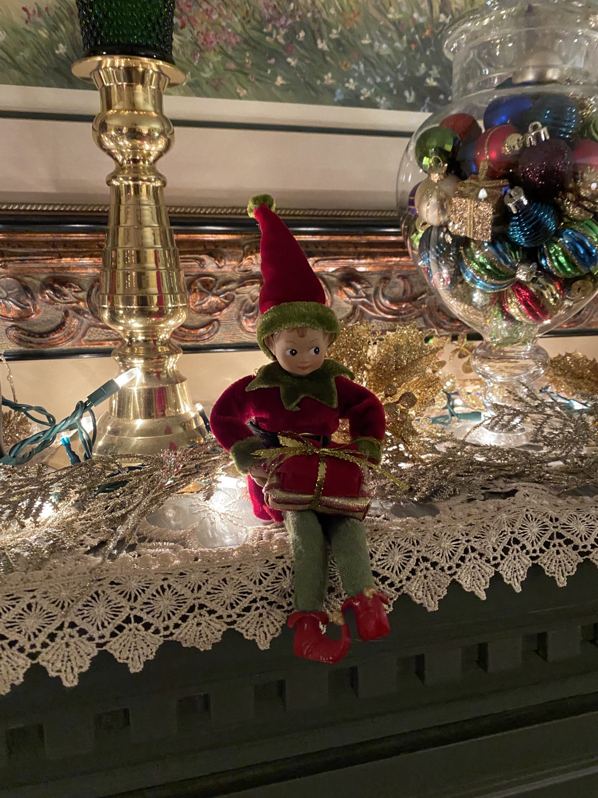 Elf sitting on a shelf